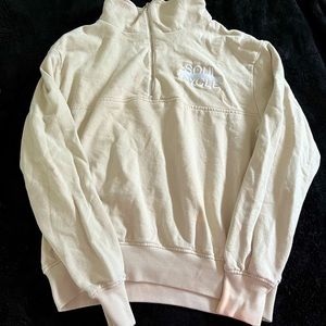 Cream color soul cycle quarter zip size medium logo sweater